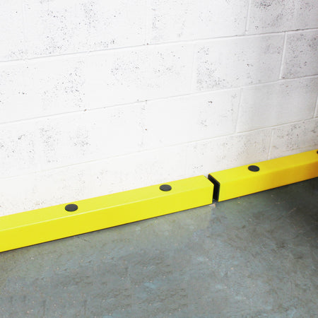 Floor level barrier for low-level warehouse protection