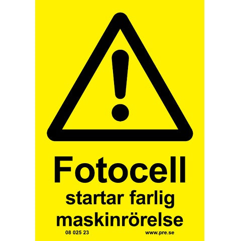 Varningsskylt. Fotocell startar farlig maskin